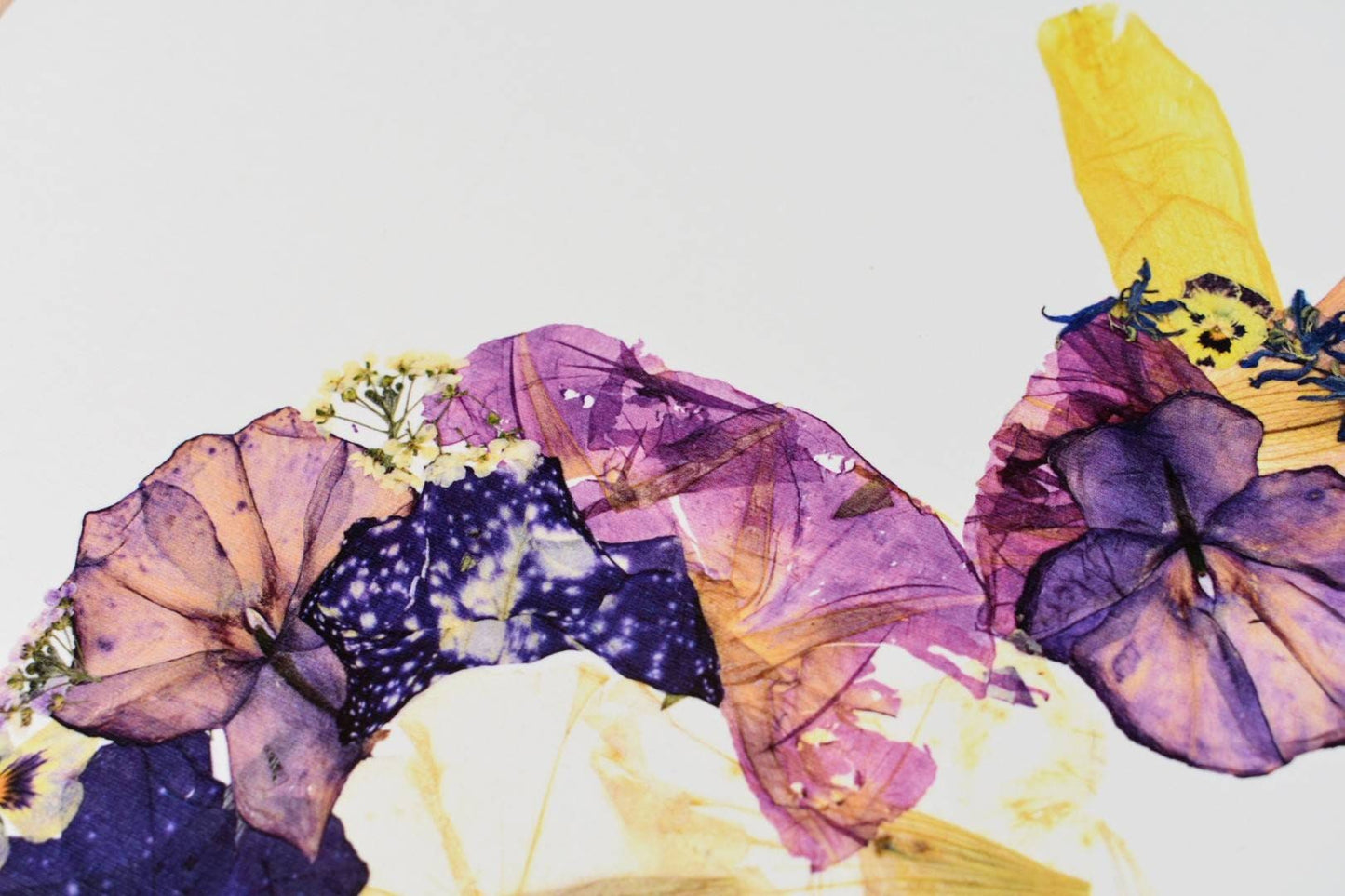 Bridal bouquet preservation displayed as elegant pressed flower artwork.