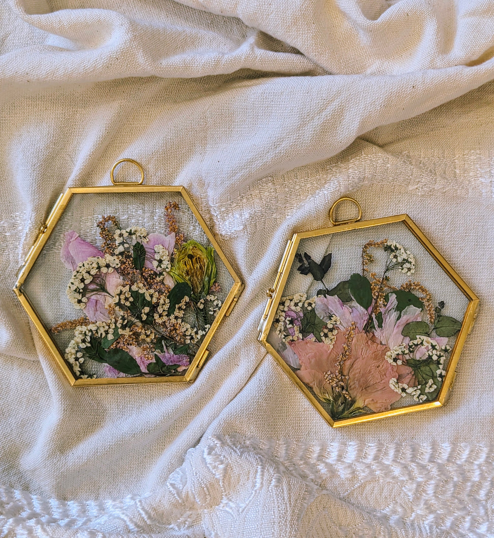 Pressed flower art showcasing preserved wedding flowers in a vintage frame