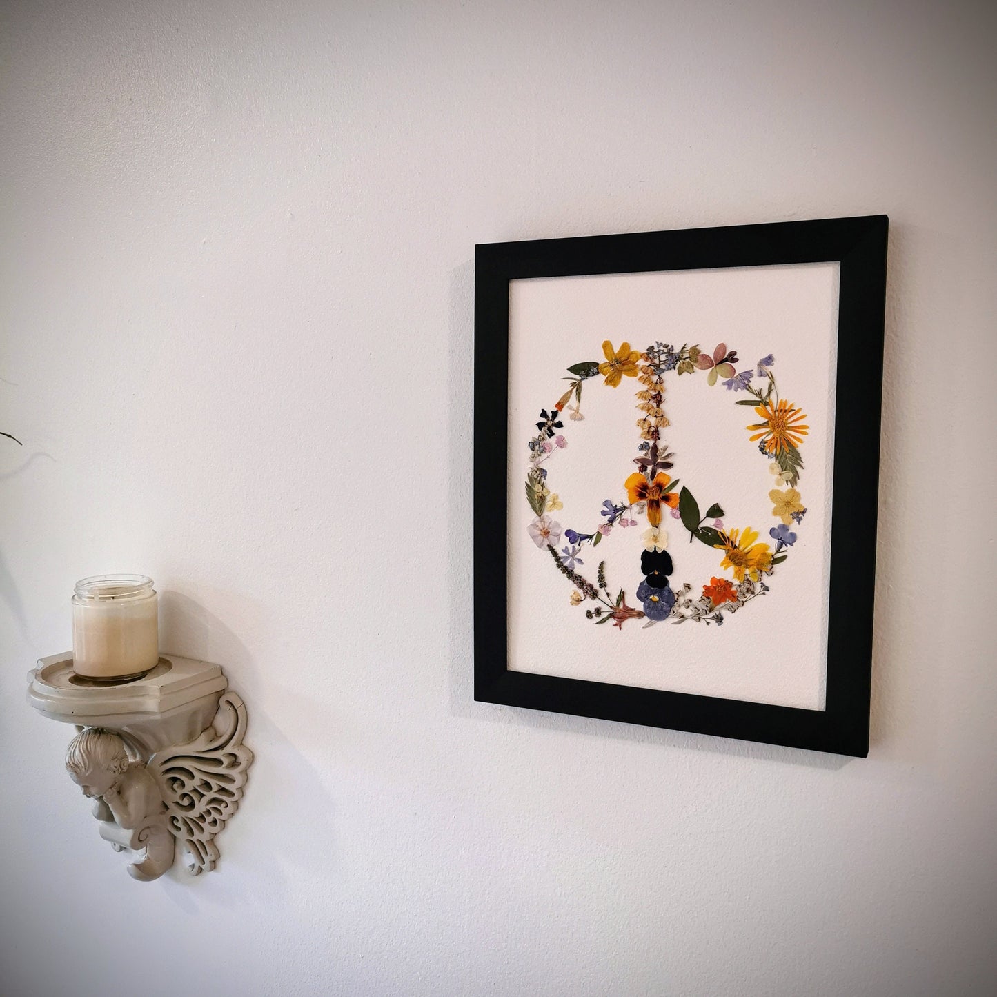 Elegant wedding bouquet preservation displayed as pressed flower art.